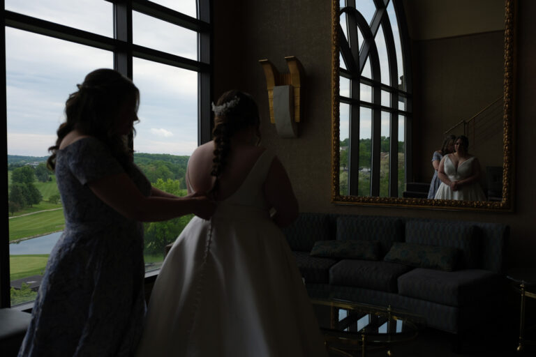 Maddie getting ready by the window at Heritage Hills Golf Resort in York, PA