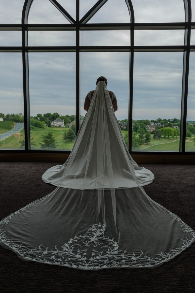 Maddie's cathedral veil by the window at Heritage Hills Golf Resort