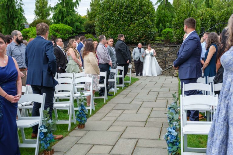 Maddie walking down the aisle at her outdoor Heritage Hills Golf Resort wedding in York, PA