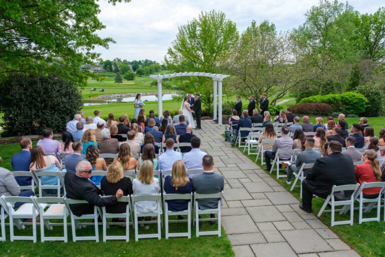 Guests gathered on the lawn for Dan and Maddie's outdoor ceremony at Heritage Hills