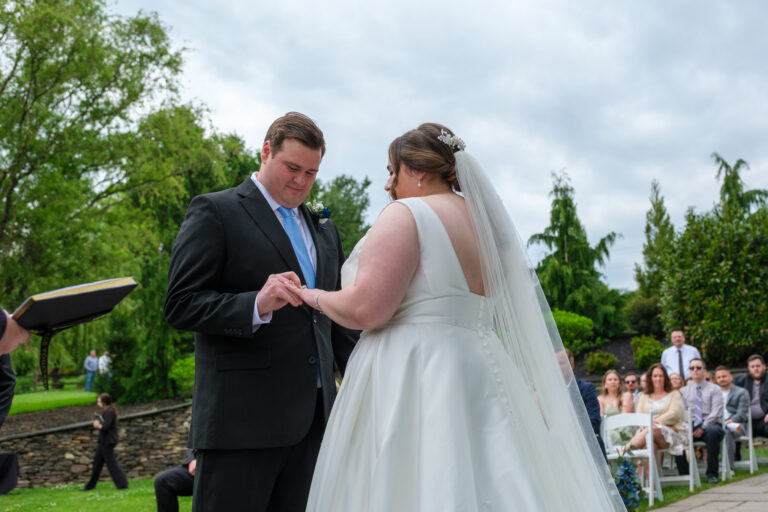 Dan and Maddie exchanging rings at their Heritage Hills Golf Resort wedding in York, PA