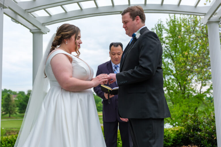 Ring exchange under the pergola at Heritage Hills Golf Resort in York, PA