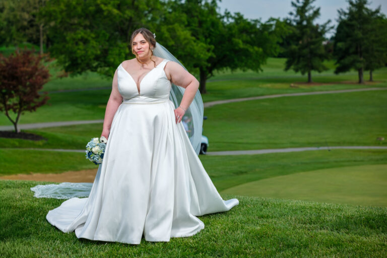 Maddie laughing during her bridal portraits at Heritage Hills Golf Resort