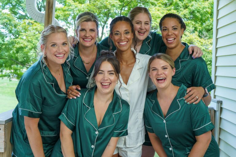 Jess with her bridesmaids in green pajamas at Rockfield Manor in Bel Air, MD